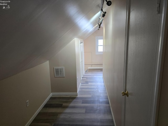 430 Perry St, Sandusky, OH 44870 - bonus room featuring wood finished floors, baseboards, vaulted ceiling, and visible vents