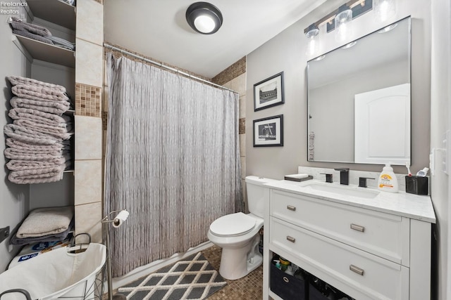 full bath featuring curtained shower, vanity, and toilet