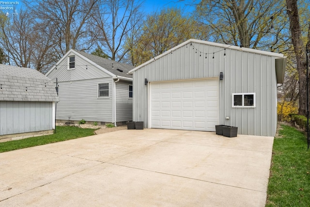 exterior space featuring concrete driveway