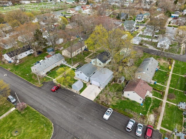 birds eye view of property with a residential view