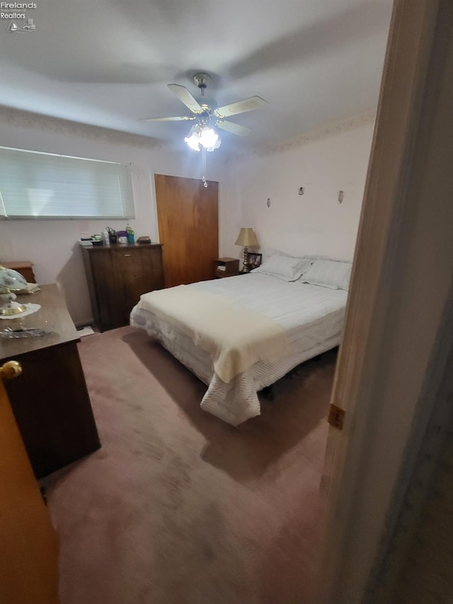 bedroom featuring ceiling fan