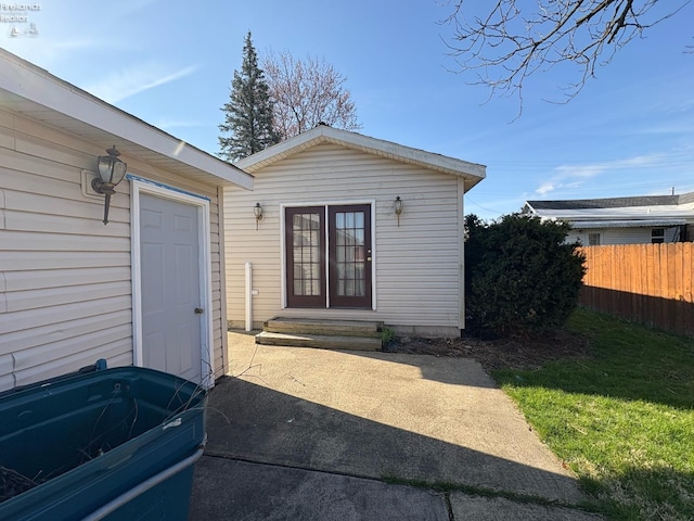 property entrance featuring fence