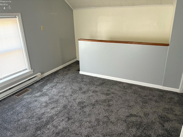 unfurnished room featuring a baseboard radiator, dark colored carpet, visible vents, and baseboards