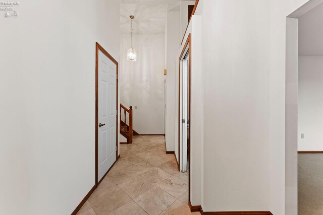 1001 Birchwood Dr, Sandusky, OH 44870 - corridor with baseboards and stairs