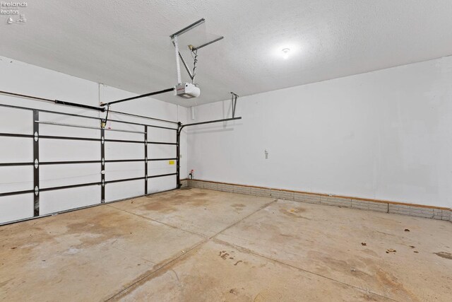1001 Birchwood Dr, Sandusky, OH 44870 - garage with a garage door opener