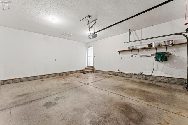 1001 Birchwood Dr, Sandusky, OH 44870 - garage with a garage door opener