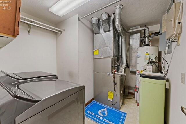 1001 Birchwood Dr, Sandusky, OH 44870 - utilities with washer and dryer, water heater, and heating unit