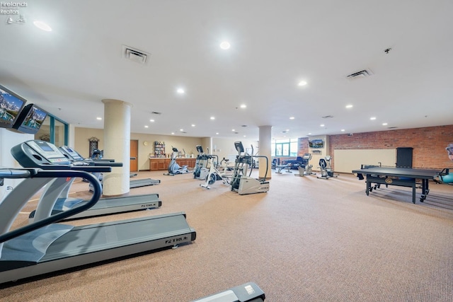 gym featuring decorative columns, visible vents, recessed lighting, and carpet floors