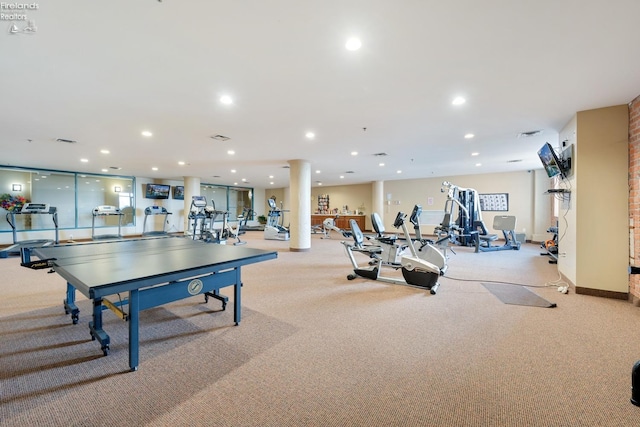 workout area with recessed lighting, baseboards, light carpet, and decorative columns