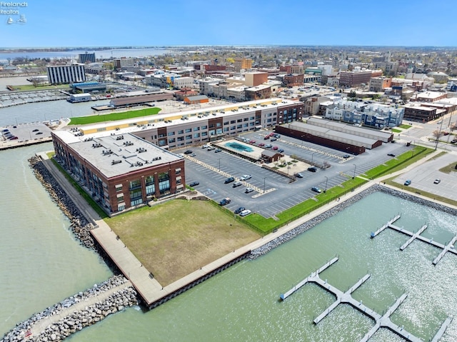 aerial view with a water view and a view of city