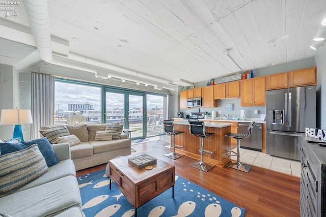 living area with light wood-style floors
