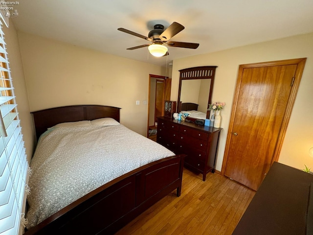 bedroom featuring ceiling fan and light wood-style floors