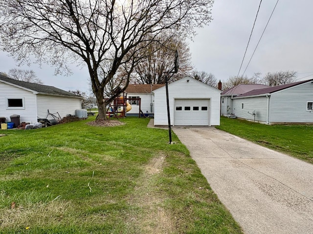 detached garage with concrete driveway
