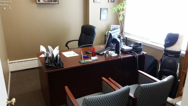 office space with baseboard heating and carpet floors