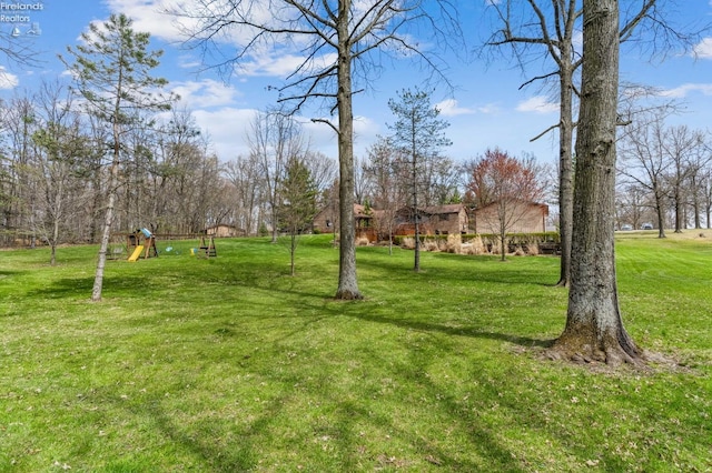view of yard with a playground