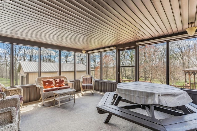 sunroom / solarium with a wealth of natural light