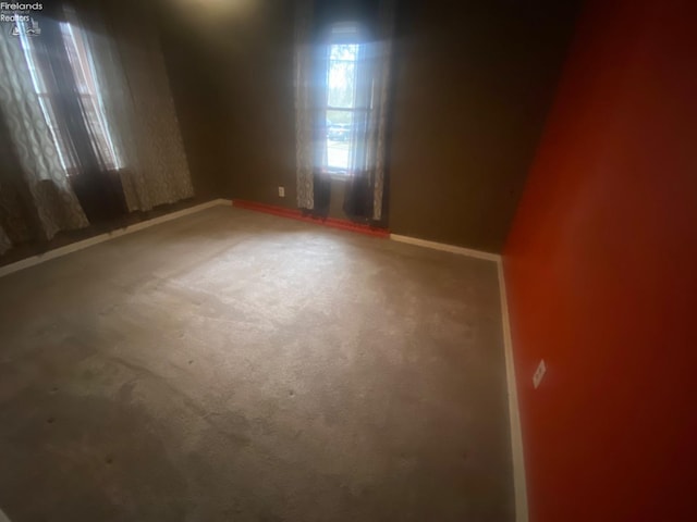 457 Morrison St, Fremont, OH 43420 - empty room featuring baseboards and carpet floors