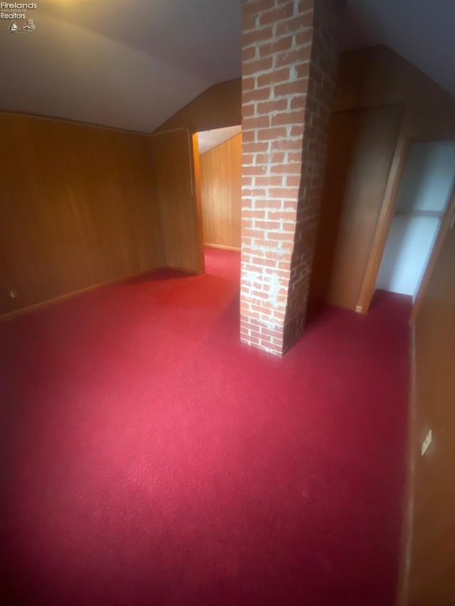 457 Morrison St, Fremont, OH 43420 - bonus room featuring vaulted ceiling, wood walls, and carpet