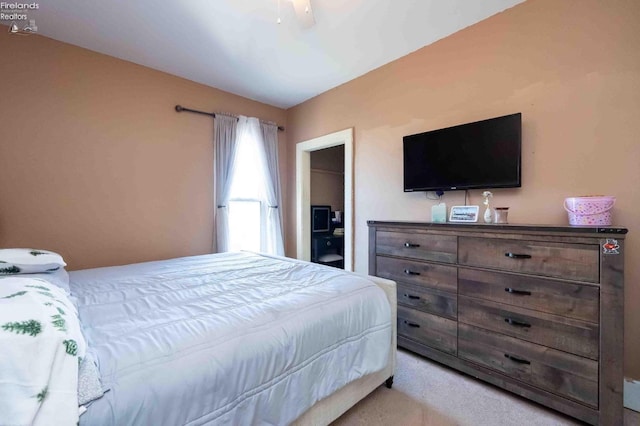 bedroom featuring carpet