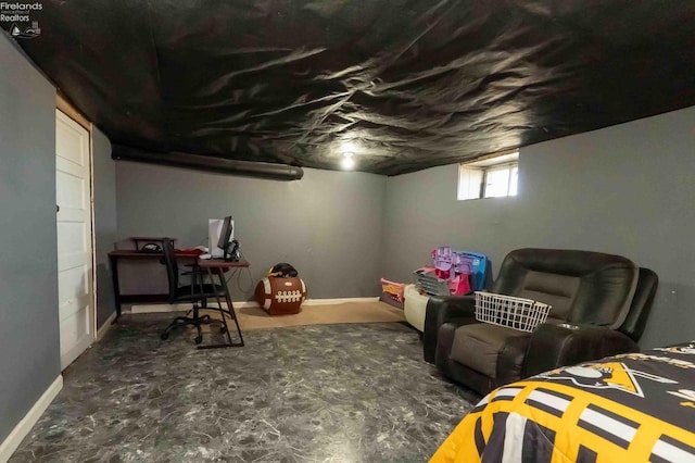 below grade area featuring baseboards