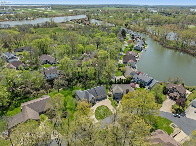 aerial view featuring a water view and a residential view