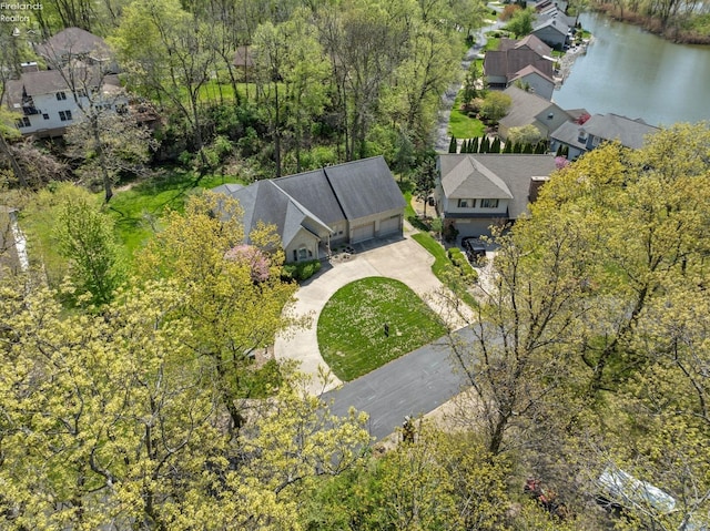 drone / aerial view with a water view