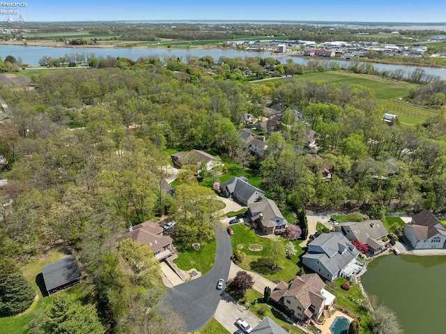 aerial view featuring a water view and a residential view