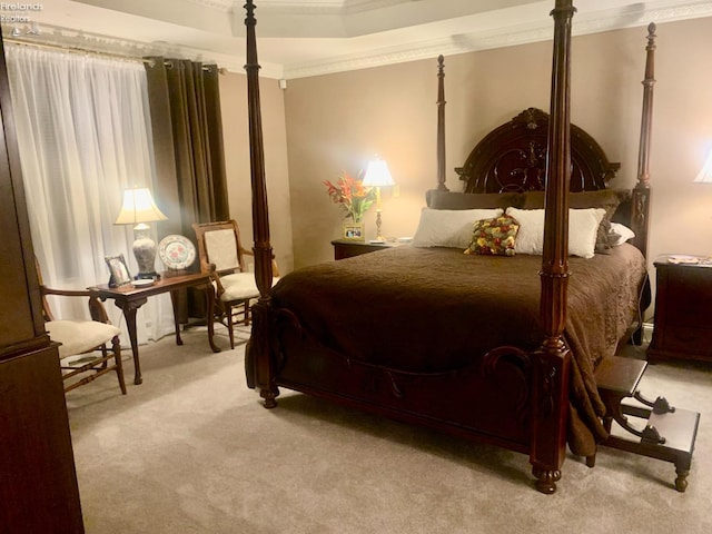 bedroom featuring light carpet and ornamental molding