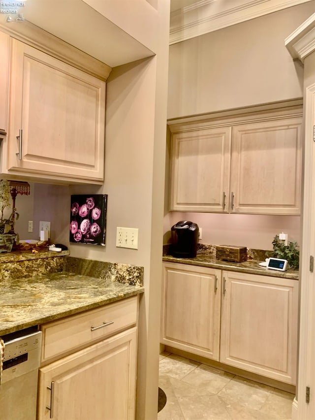 bar featuring white dishwasher, light tile patterned floors, and crown molding