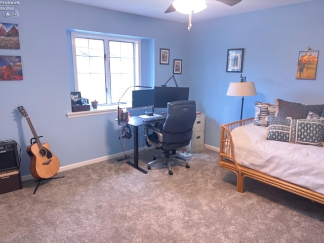 carpeted bedroom with baseboards and ceiling fan
