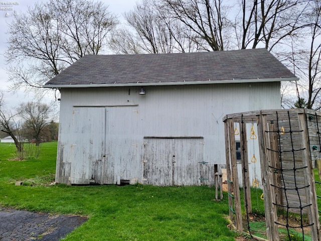 view of outbuilding featuring an outdoor structure