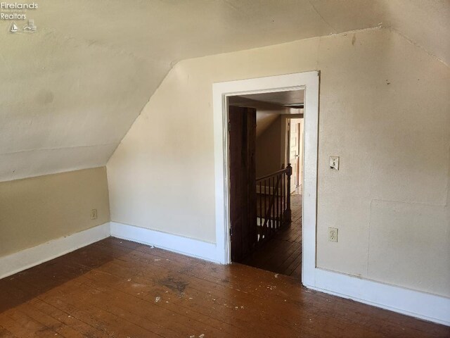 1501 E State St, Port Clinton, OH 43452 - additional living space featuring hardwood / wood-style flooring, vaulted ceiling, and baseboards