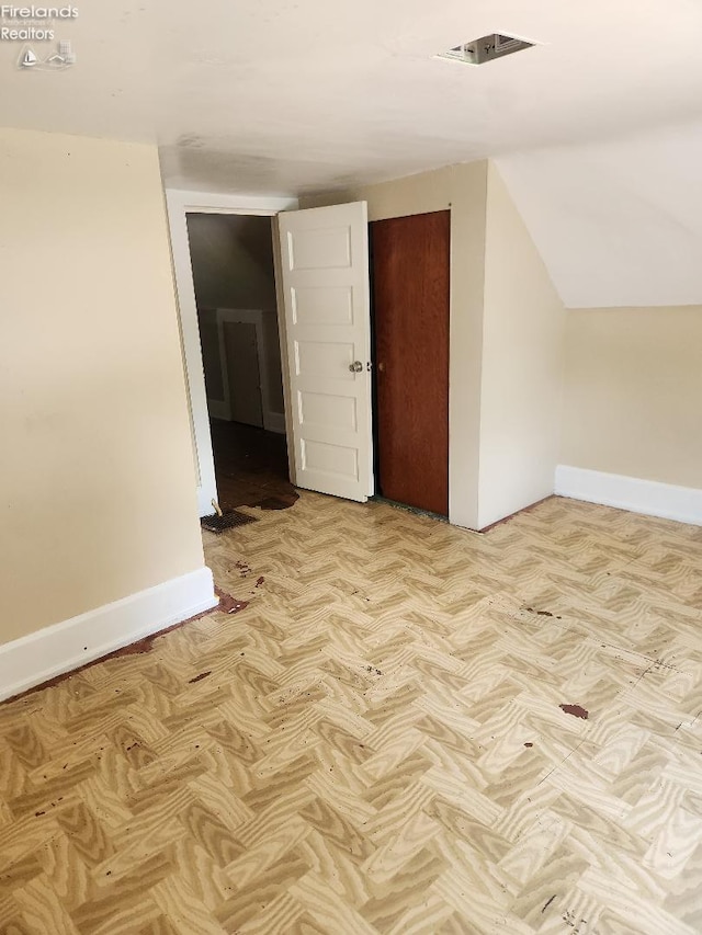 1501 E State St, Port Clinton, OH 43452 - additional living space featuring baseboards and lofted ceiling