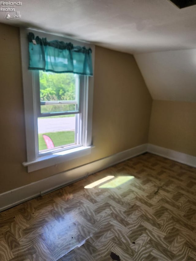 1501 E State St, Port Clinton, OH 43452 - bonus room featuring lofted ceiling and baseboards
