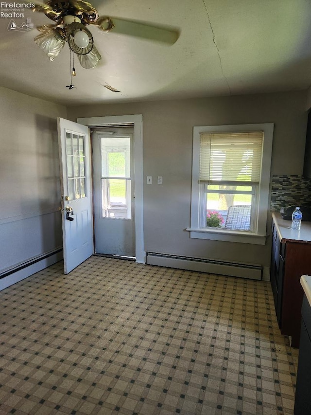 1501 E State St, Port Clinton, OH 43452 - foyer featuring a baseboard heating unit and a ceiling fan