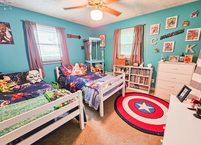 bedroom featuring carpet floors and a ceiling fan