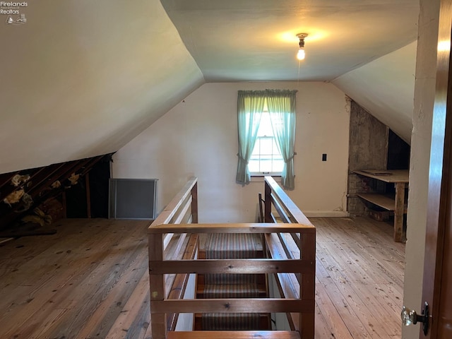 201 Gilcher Ct, Sandusky, OH 44870 - bonus room with lofted ceiling and hardwood / wood-style floors