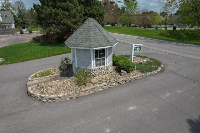 4340 E Mckenna Ln, Port Clinton, OH 43452 - exterior view of a shingled roof and driveway