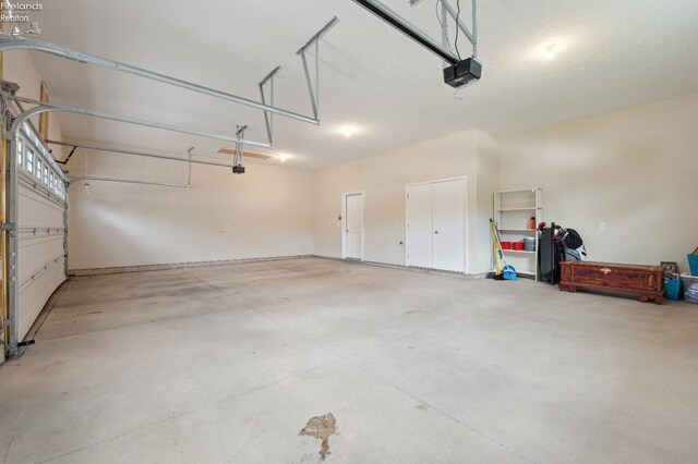 4340 E Mckenna Ln, Port Clinton, OH 43452 - garage featuring a garage door opener