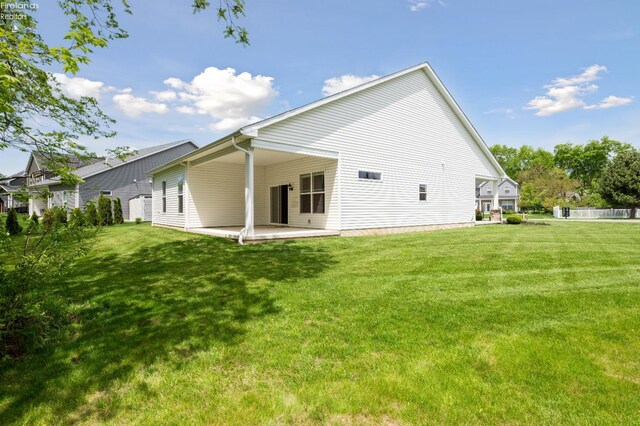 4340 E Mckenna Ln, Port Clinton, OH 43452 - back of house featuring a patio and a lawn