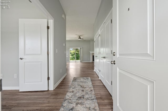 4340 E Mckenna Ln, Port Clinton, OH 43452 - hallway with dark wood-type flooring and baseboards