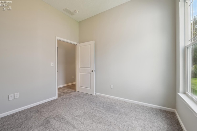 4340 E Mckenna Ln, Port Clinton, OH 43452 - carpeted empty room with baseboards