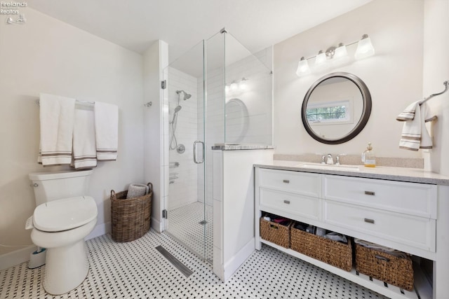 2951 N Chickadee Prt, Clinton, OH 43452 - bathroom featuring toilet, baseboards, a shower stall, and vanity