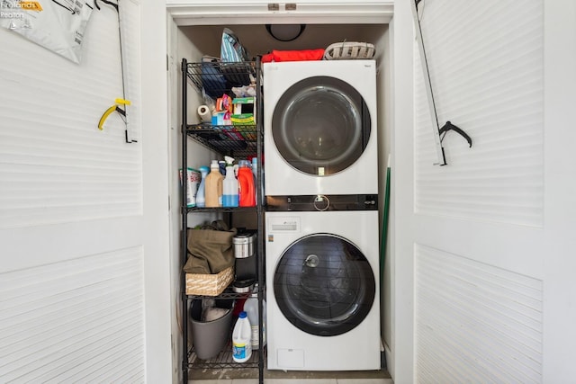2951 N Chickadee Prt, Clinton, OH 43452 - washroom featuring stacked washer and dryer and laundry area