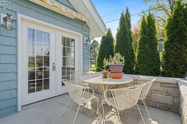 2951 N Chickadee Prt, Clinton, OH 43452 - view of patio / terrace with outdoor dining area and french doors
