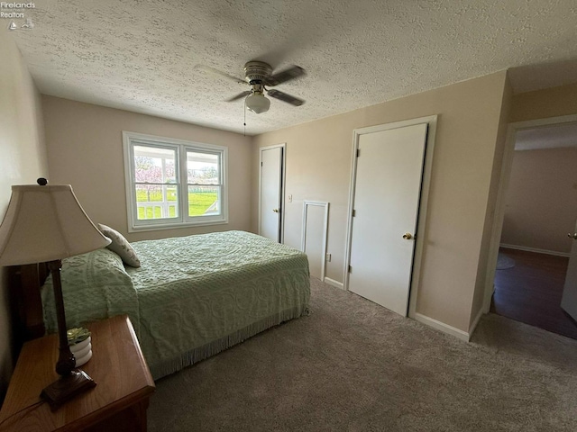 120 Schiller Ave, Sandusky, OH 44870 - bedroom with carpet floors, a ceiling fan, a textured ceiling, and baseboards