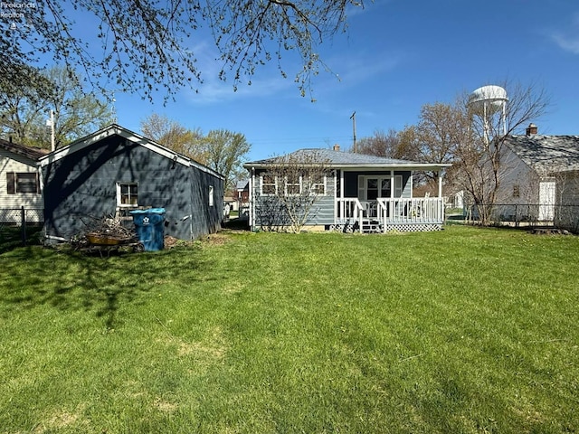 120 Schiller Ave, Sandusky, OH 44870 - rear view of house with a lawn and fence