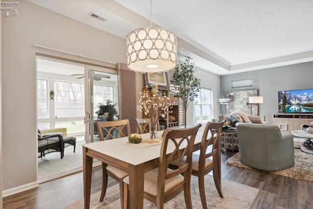 4220 Mckenna Ln, Port Clinton, OH 43452 - dining room featuring visible vents, wood finished floors, and ceiling fan