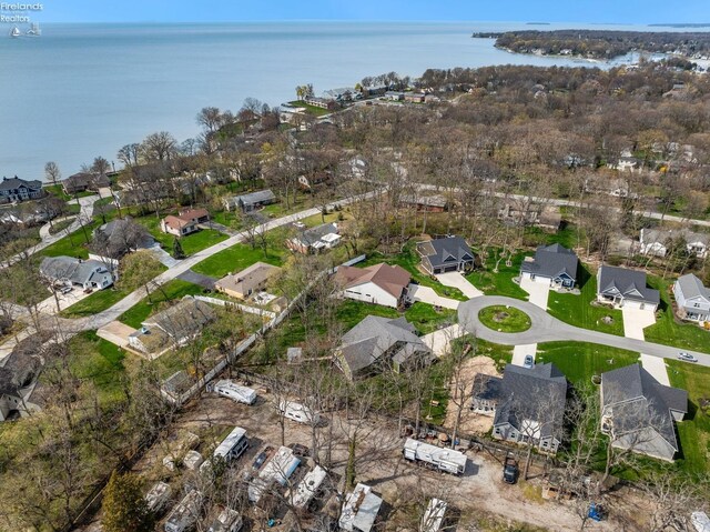 4220 Mckenna Ln, Port Clinton, OH 43452 - drone / aerial view featuring a residential view and a water view