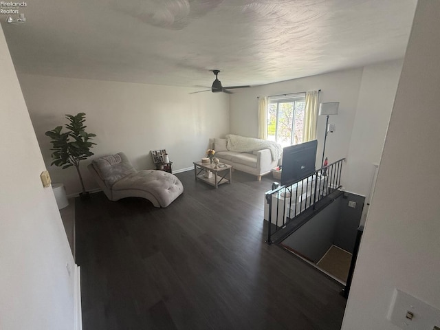 2208 S Oldgate Rd, Sandusky, OH 44870 - living room featuring baseboards, a ceiling fan, and wood finished floors